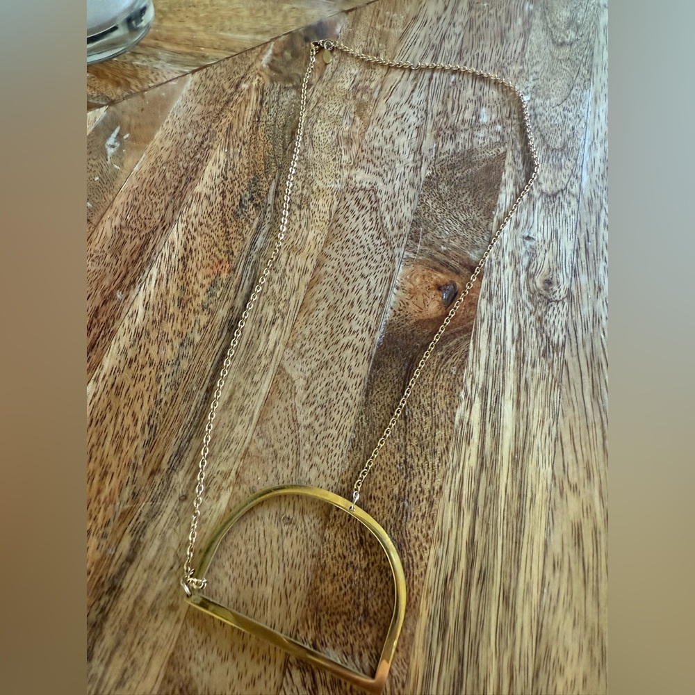 Gold “D” sideways necklace